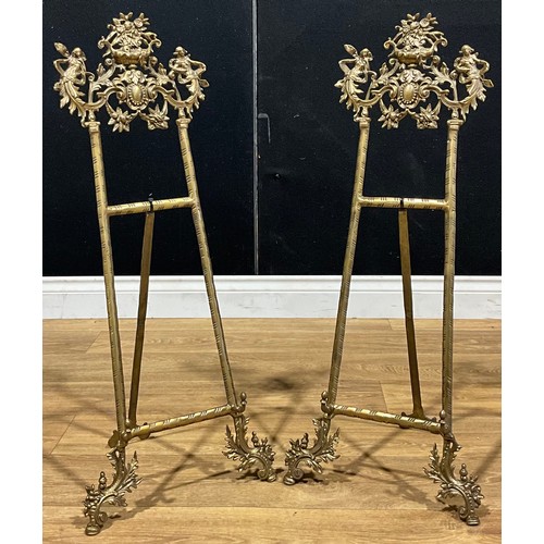 446 - A large pair of gilt metal Baroque style easel stands, 77cm high open, lacking screws