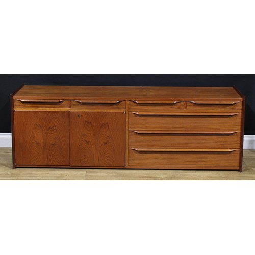 3345 - A mid-20th century teak composed modular ‘floating’ wall system, comprising sideboard, bookcase or d... 