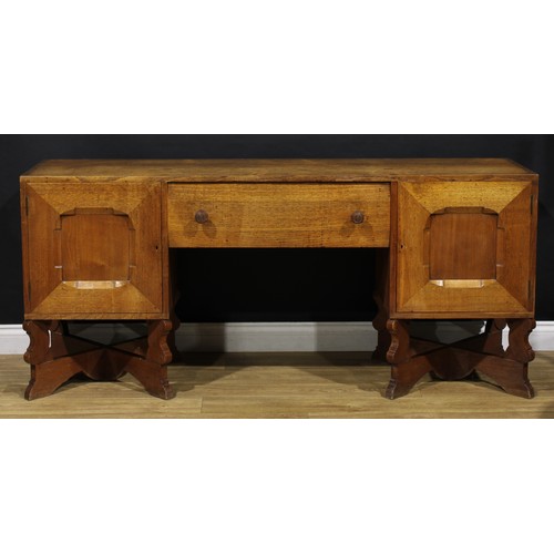 3374 - An Arts & Crafts oak sideboard, by Arthur Romney Green (1872-1945), flush rectangular top above a ce... 