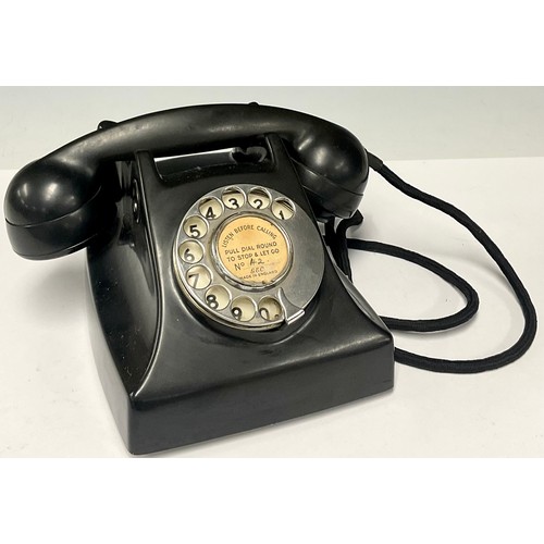 485 - A black bakelite telephone, TEL/17T/ATS