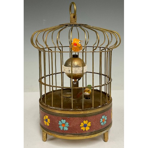 487 - A novelty birdcage timepiece, mechanical movement, 19cm tall over loop