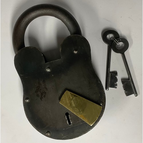 495 - A large iron padlock, brass escutcheon, 23.5vm high, two keys