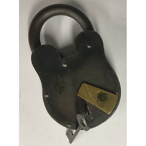 495 - A large iron padlock, brass escutcheon, 23.5vm high, two keys