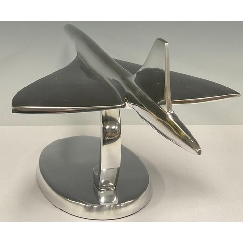 497 - A large chrome desk model of Concorde, on stand, 61cm long, 19.5cm high