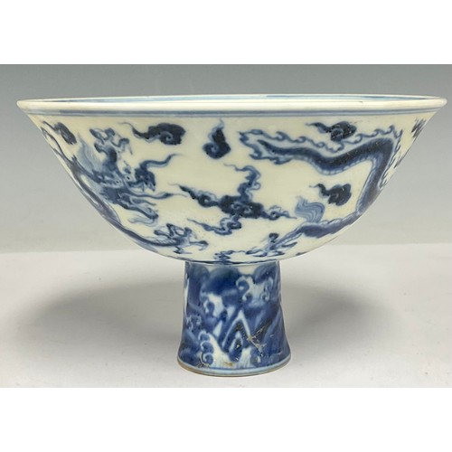 498 - A contemporary Chinese blue and white porcelain stem cup, four character mark, 17cm diameter, 11cm h... 