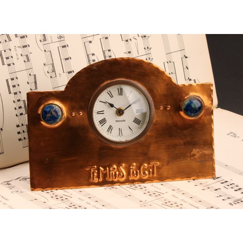 2401 - An Arts & Crafts copper easel time piece, 5cm dial inscribed Mercedes, Roman numerals, the arched bo... 