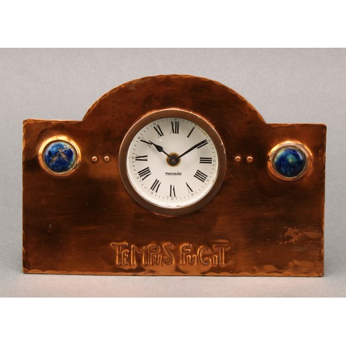 2401 - An Arts & Crafts copper easel time piece, 5cm dial inscribed Mercedes, Roman numerals, the arched bo... 