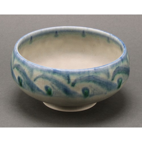 2410 - A Pilkington's Royal Lancastrian bowl, decorated in tones of mottled blue and green with stylised Vi... 