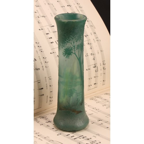 2464 - A Daum Nancy cameo glass vase, decorated in tones of green with a woodland landscape, 20cm high, sig... 