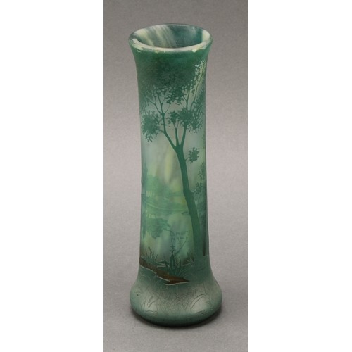 2464 - A Daum Nancy cameo glass vase, decorated in tones of green with a woodland landscape, 20cm high, sig... 