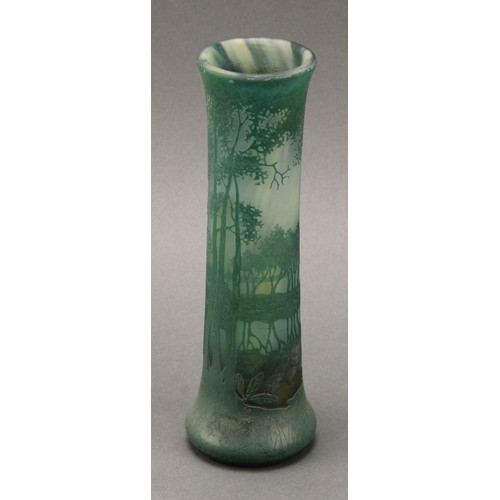 2464 - A Daum Nancy cameo glass vase, decorated in tones of green with a woodland landscape, 20cm high, sig... 