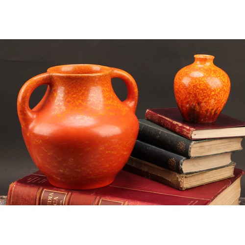 2444 - A Pilkington's Royal Lancastrian two handled ovoid vase, glazed in tones of mottled orange, 18cm hig... 