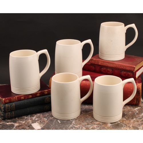 2447 - A set of five Wedgwood mugs, designed by Keith Murray (1892-1981)