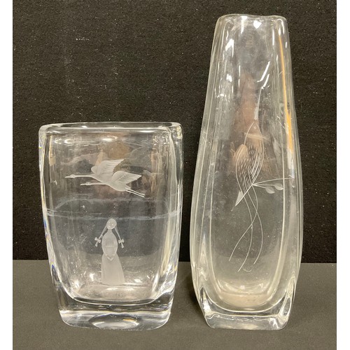 2418 - An Orrefors glass vase, engraved with a girl, and swans in flight, 20cm high, etched mark; another v... 