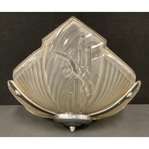 2394 - An Art Deco style chrome and pressed glass ceiling shade, moulded with nude female dancers, 36cm wid... 