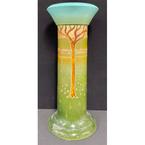 2456 - An art pottery jardinière stand, tube lined with trees in a landscape, 73cm high, c. 1880