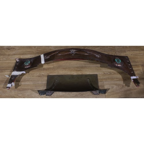 2398 - An Arts & Crafts copper and enamel fireplace canopy, embossed with sinuous organic motifs on a plani... 