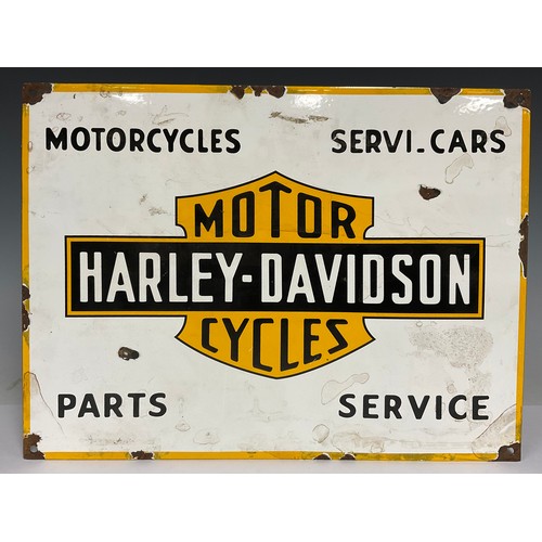 562 - A replica tin advertising sign, Harley-Davidson Motor Cycles, approx. 40cm x 30cm