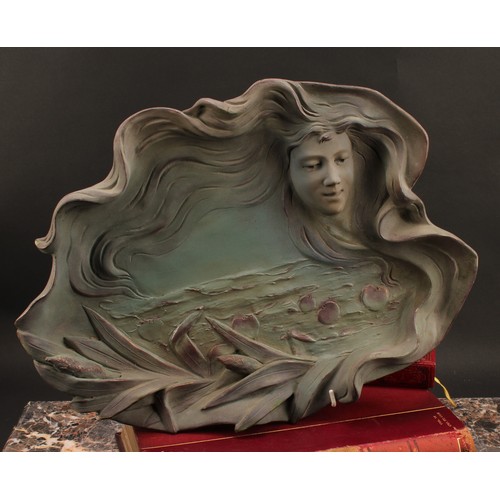 3025A - A French Art Nouveau style wall plaque, modelled with a beauty in relief, her flowing locks surround... 