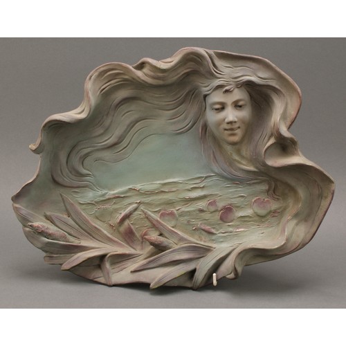 3025A - A French Art Nouveau style wall plaque, modelled with a beauty in relief, her flowing locks surround... 