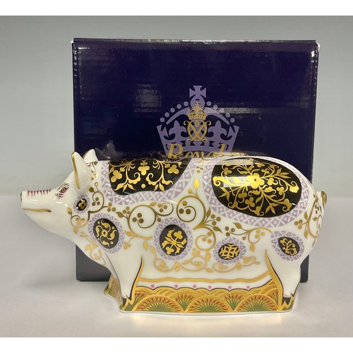 5041 - A Royal Crown Derby paperweight, Spotty Pig, first quality, printed marks. boxed