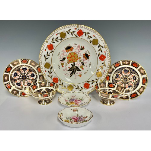 5059 - A Royal Crown Derby 1128 Imari pattern cup and saucer, first quality; another similar, associated sa... 