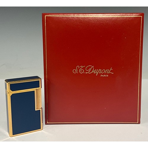 5061 - An S.T. Dupont canted rectangular cigarette lighter, gold plate and enamel, Chinese character marks,... 