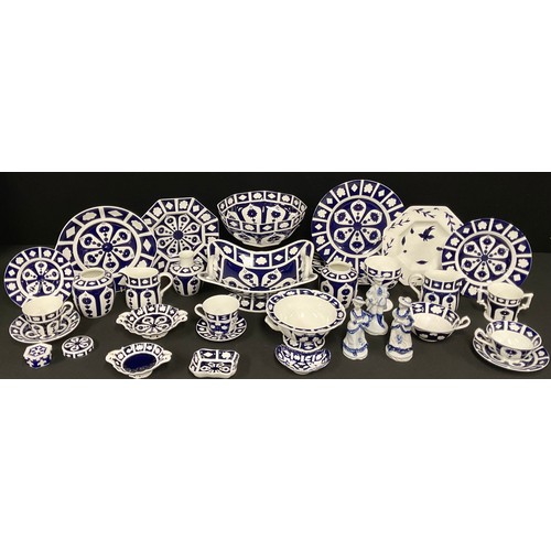 5098 - Ceramics - a large quantity of Royal Crown Derby blue and white unfinished, including two handles pe... 