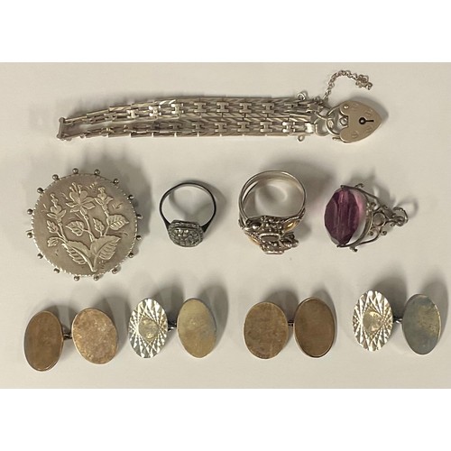 5131 - Two pairs of silver cufflinks; a silver bracelet; a Victorian brooch; swivel fob; marcasite ring; or... 