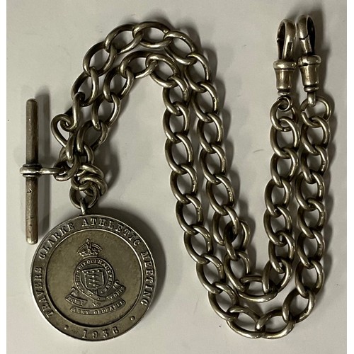 5132 - A hallmarked silver double Albert, Travers Clarke Athletic Merit 1936