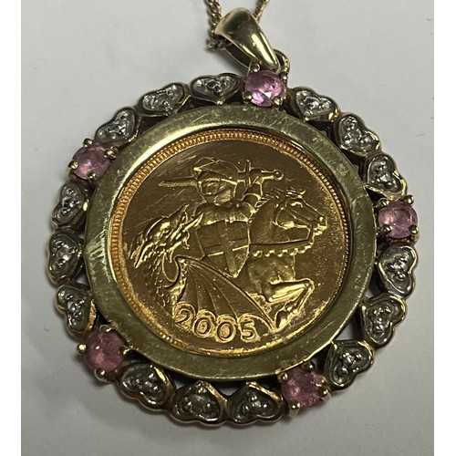5150 - A half soverign, 2005, in mount set with diamond chips and pink stones, 9ct gold chain, 10.9g gross