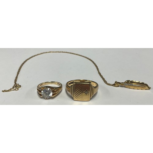 5154 - A 9ct gold and diamond leaf shaped pendant, 9ct gold chain; a 9ct gold signet ring; a 9ct gold and w... 