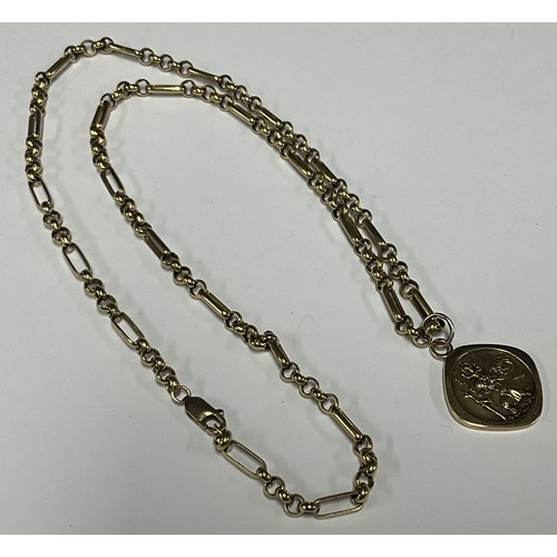 5163 - A 9ct gold St Christopher pendant necklace, 9ct gold fancy link chain, stamped 375, 9, 49cm long, 10... 