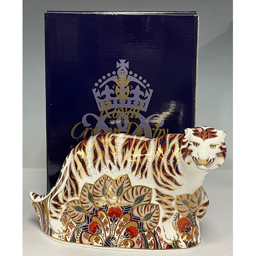 5003 - A Royal Crown Derby paperweight, Bengal Tiger, 22cm long, gold stopper, printed marks in red, boxed