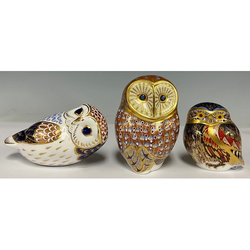 5010 - A Royal Crown Derby paperweight, Barn Owl, designed by John Ablitt, gold stopper; others, Little Owl... 