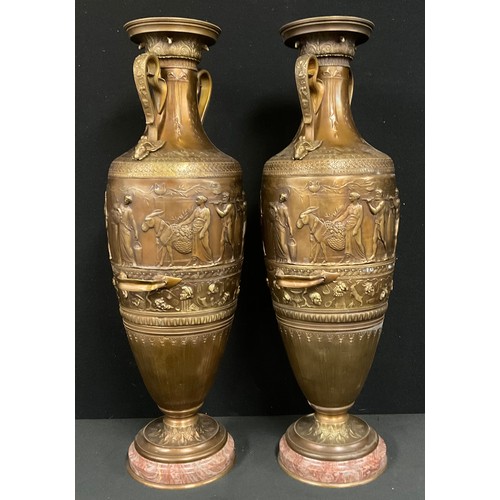 5503 - A pair of large neo-classical bronzed metal twin handled urns, after Fedinand Barbedienne, each moun... 