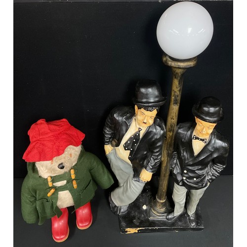 5531 - A Novelty Laurel and Hardy table lamp, white globular shade, approx 85cm high overall;  a Gabriel De... 