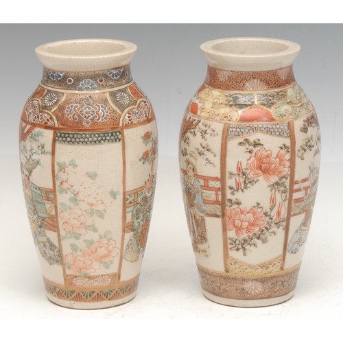 929 - A near pair of Japanese Satsuma baluster vases, painted with alternating panels of courtly figures, ... 