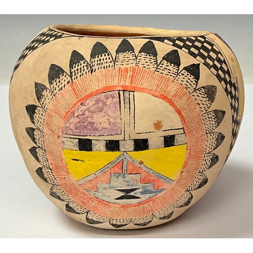 83 - Tribal Art - a Tesuque Pueblo Native American pottery ovoid vessel, decorated in polychrome with geo... 