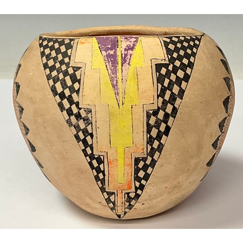 83 - Tribal Art - a Tesuque Pueblo Native American pottery ovoid vessel, decorated in polychrome with geo... 