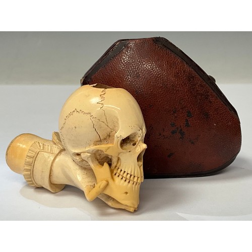 959 - The Macabre - A Victorian memento mori Meerschaum pipe, as a hand holding a skull, Morocco leather c... 