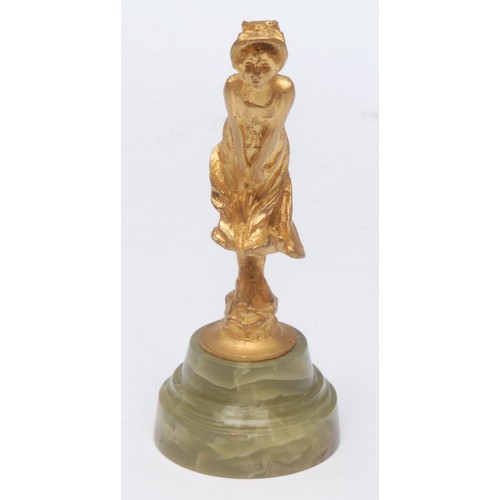 971 - A 19th/early 20th century French gilt bronze figure, as a young maiden wearing a bonnet, stepped cir... 