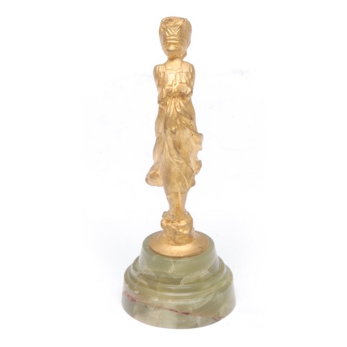 971 - A 19th/early 20th century French gilt bronze figure, as a young maiden wearing a bonnet, stepped cir... 