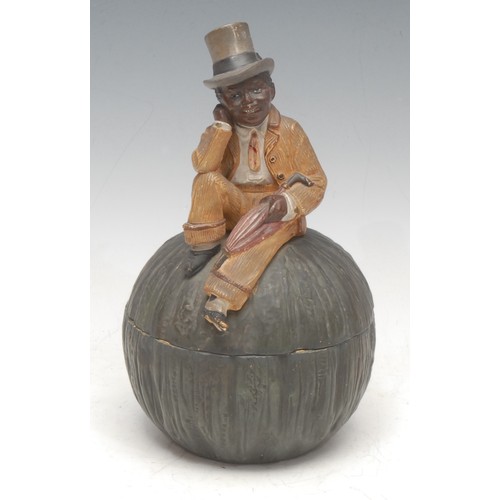 995 - Americana and the Roaring Twenties - a period ceramic novelty tobacco jar, as a fig, the cover toppe... 