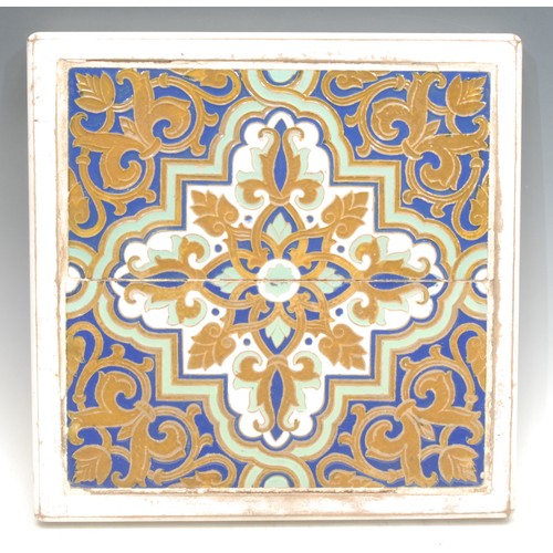 1000 - Ceramics - a pair of early 20th century Persian tiles, Islamic style quatrefoil central motif in a b... 