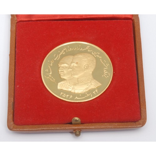 236 - An Iranian 22ct gold coin, The 100 Years Birthday of Reza Shah The Great, Iranian date 2536, 