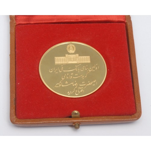 236 - An Iranian 22ct gold coin, The 100 Years Birthday of Reza Shah The Great, Iranian date 2536, 