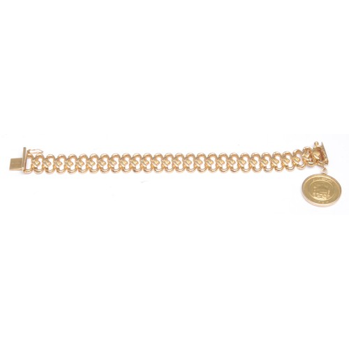 235 - An Iranian 22ct gold bracelet, suspended with a 22ct gold coin, The Freedom Coin, equivalent to 1 Pa... 