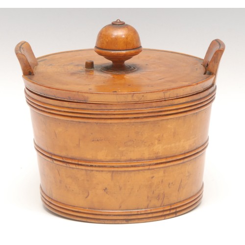 913 - Treen - an early 19th century masur birch butter tub and cover, domed knop finial, faux-coopered ban... 