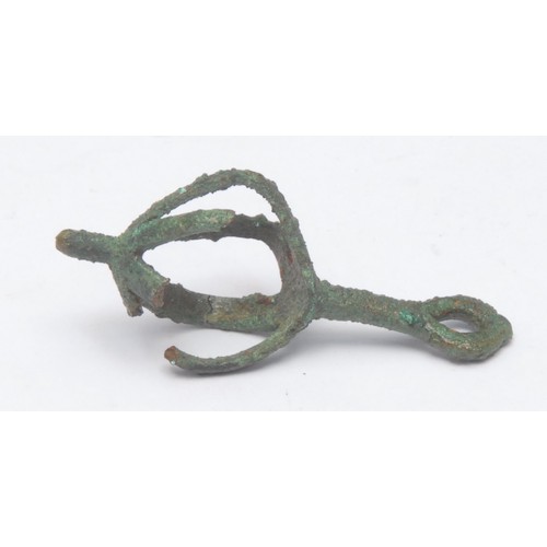 185 - Antiquities - an Iranian Luristan copper openwork fruit cage bell, 5cm long